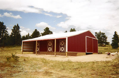 Post frame barn with dutch doors and slider